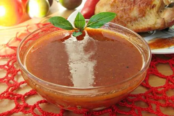 Tkemali sauce with tomatoes 