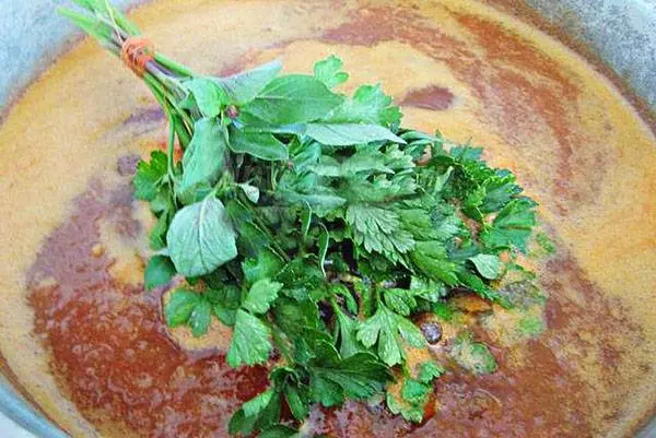 Tkemali sauce with tomatoes 