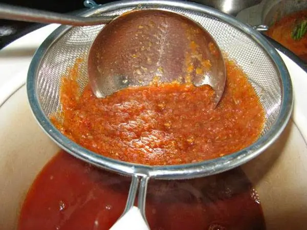 Tkemali sauce with tomatoes 