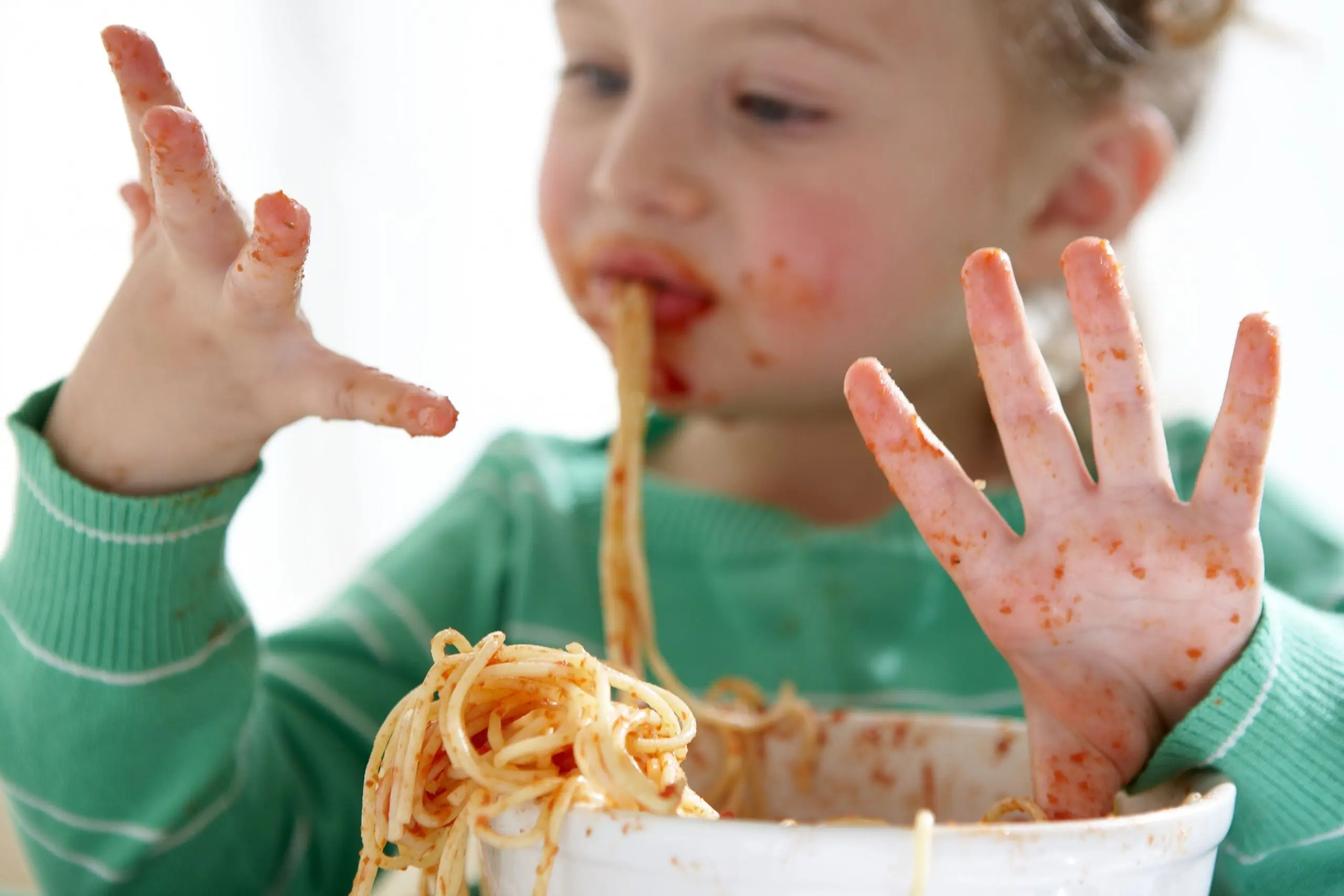 Toddlers eating with their hands eat healthier