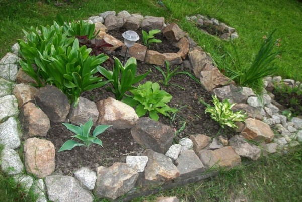 We make flower beds from stones ourselves