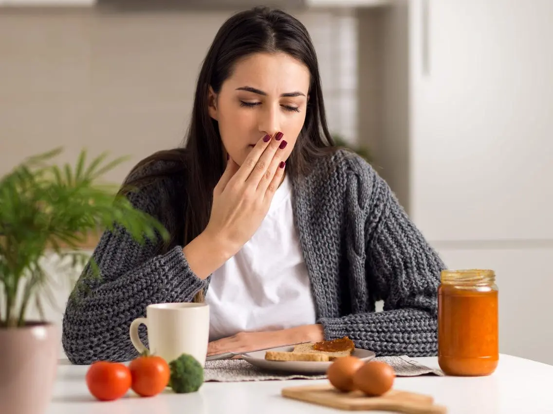 What causes nausea after eating?