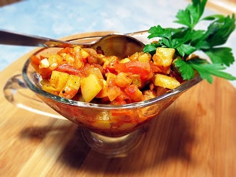 Zucchini caviar in a frying pan with cubes