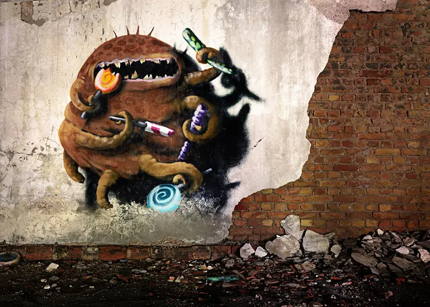 An artist draws monsters on the walls of abandoned buildings in Berlin