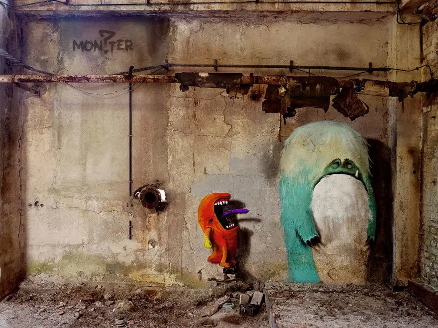 An artist draws monsters on the walls of abandoned buildings in Berlin