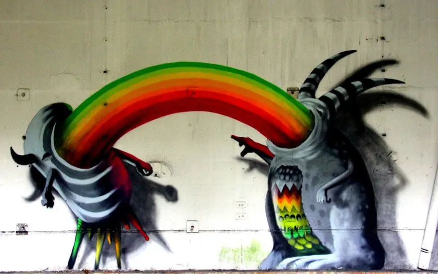 An artist draws monsters on the walls of abandoned buildings in Berlin