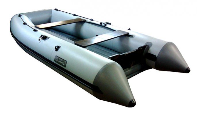 PVC boat with an inflatable bottom under the motor