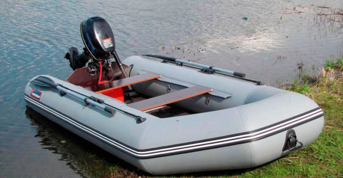 PVC boat with an inflatable bottom under the motor