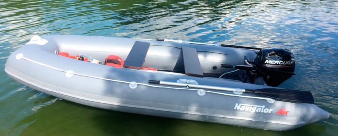 PVC boat with an inflatable bottom under the motor