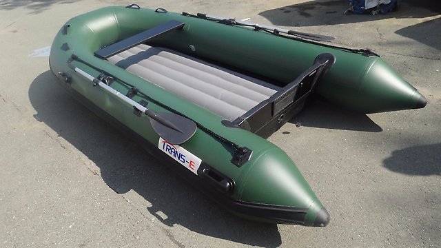 PVC boat with an inflatable bottom under the motor