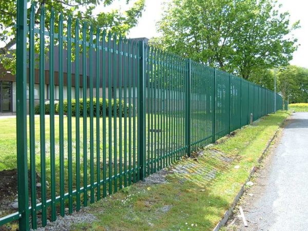 Fence from a metal picket fence: types, installation, photo