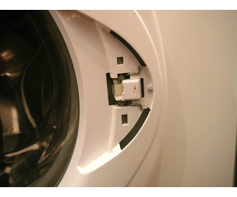 How to replace the handle on the washing machine door yourself