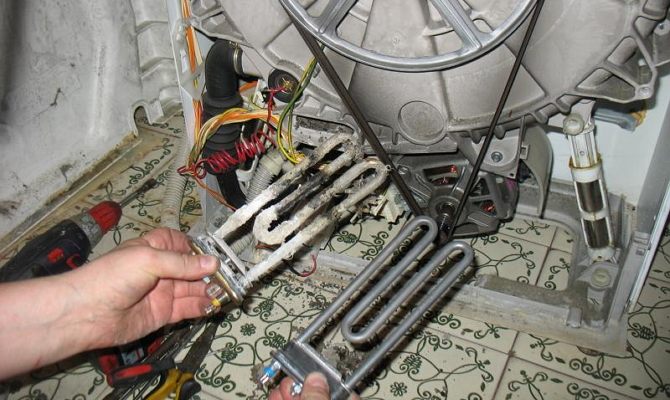 How to replace the heating element in the washing machine with your own hands