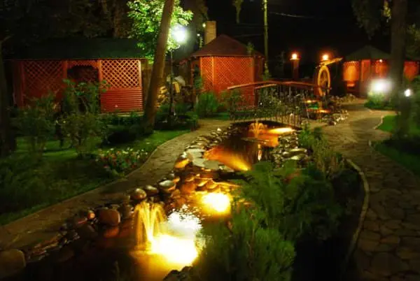 Outdoor solar-powered lamps for summer cottages and gardens, for a country house, autonomous LED power plants with a sensor, photo, video