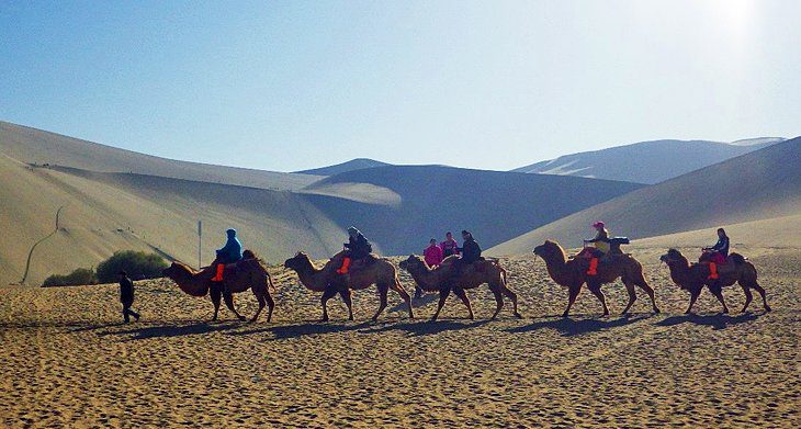 Visiting Dunhuang & Jiayuguan: Mogao Caves, Western End of the Great Wall of China & Camel Trekking